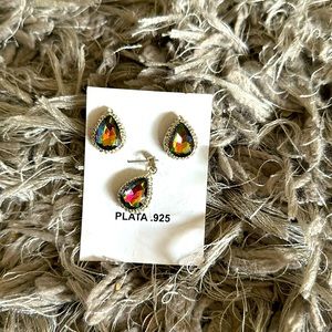 Beautiful set of earrings and a charm for the necklace.